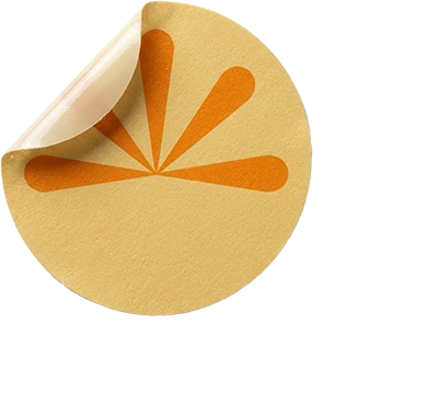 Et rundt Luvora-plaster til navlen med solmotiv